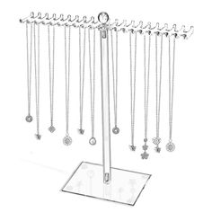 a jewelry rack with many different necklaces hanging from it