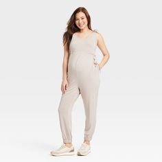 From brunch dates to baby showers and more, this Sleeveless Maternity Leisure Jumpsuit from Isabel Maternity by Ingrid & Isabel ™ is a go-to pick for any occasion. This maternity leisure jumpsuit is made of heavyweight, stretchy jersey fabric with elastic at leg-opening for comfortable all-day wear. The straight leg and scoop neckline provide a sophisticated twist, while the side tie-closure and adjustable straps offer a flattering look. Pair with your choice of footwear and accessories to compl Brunch Dates, Maternity Tank Tops, Women Nurse, Maternity Jumpsuit, Pregnancy Tshirts, Knitted Romper, Maternity Fashion, Maternity Clothes, Baby Showers