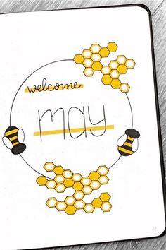 a welcome card with bees and honeycombs