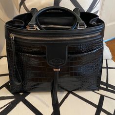 Tod’s Black Handbag With Crocodile Stamped And Plain Leather, 13” X 10” X 6”, Handle 5” Drop, Optional Shoulder Strap 33”-41” Long, 2 Exterior Pockets 1 Zippered, Side Snaps, 2 Zippered Interior Pocket, Pristine Condition, No Wear, Very Structured High-end Travel Bags With Crocodile Pattern, Black Satchel With Detachable Handle For Business Trips, High-end Crocodile Pattern Travel Bags, Designer Black Shoulder Bag With Crocodile Pattern, Luxury Bags For Business Trips With Silver-tone Hardware, Designer Black Crocodile Pattern Bag, Luxury Black Bags With Crocodile Pattern, Luxury Black Crocodile Pattern Bag, Designer Shopping Bags With Crocodile Pattern