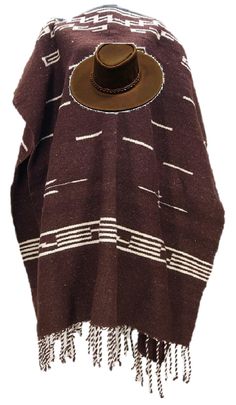 PRICES MAY VARY. 100% WOOL WITH LEATHER REINFORCED COLLAR THIS NEW CLINT EASTWOOD SHARPSHOOTER BRAND WESTERN STYLE HAND WOVEN 100% WOOL PONCHO & LEATHER HAT SET IS JUST RIGHT FOR COOL DAYS AND COLDER NIGHTS. THE HAND WOVEN PONCHO AND LEATHER HAT STYLISHLY REPLICATES THE OUTFIT CLINT WEARS IN HIS WESTERN MOVIES "THE GOOD, THE BAD, AND THE UGLY", "FISTFUL OF DOLLARS", AND "FOR A FEW DOLLARS MORE". YOU CAN HAVE SPAGHETTI WESTERN STYLE WHILE KEEPING OFF THE CHILL. EACH OF THESE SPAGHETTI WESTERN STY Handmade Southwestern Brown Fedora, Clint Eastwood Poncho, Handmade Brown Shawl Poncho, Handmade Brown Bohemian Poncho, Bohemian Brown Shawl Poncho, Spaghetti Western, Wool Poncho, Cold Night, Leather Hats