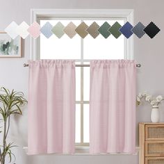 a window with pink curtains in front of it