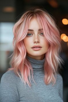 Dive into these dreamy pink hairstyles! Add hints of lavender, blend peach tones, or go for a radiant hot pink to create your signature look.