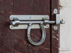 an image of a metal handle on a door