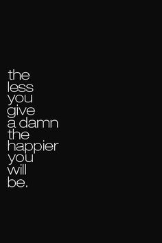 the less you give a damn the happier will be quote on black background