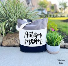 "Autism Mom Tote Bag, Mom Gift Bag, Mothers Day Gift, Autism Awareness Bags, Proud Autism Mom Gift, Gift for Autism Mom HOW TO ORDER: 1. Please, Check and Review all Photos. 2. Select Your Bag and Design Colors from drop down menus 3. Choose Your Quantity as much as you want. 4. Click \"Add To Cart\". For multiple items go back to the listing and repeat the steps. *DETAILS OF THE BAGS: Regular Tote Bag Measurements - 15\"L x 16\"H Tri Color 11L Toe Bag Measurements - 15\"L x 15\"H x 3\"D 100% co Mom Hero, Bag Measurements, Teacher Gift, Mom Gift, Tri Color, You Bag, Gift Bag, Teacher Gifts