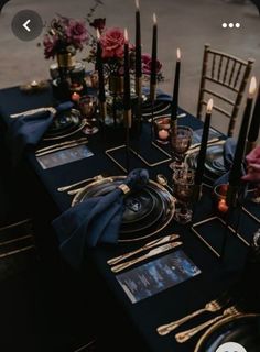 an image of a table setting with candles and place settings for dinner party or special event