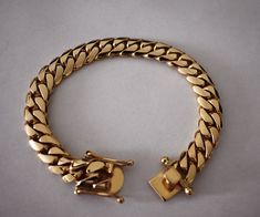 Very impressive authentic Miami Cuban link bracelet, made from solid 18K gold. Made by a Cuban American artist, who specialized in hand crafting Cuban links for over two decades. All our 18K gold Cuban links are made from 18K Plumb (18K+ pure) gold, with ultra high polished finish. Bracelet looks even better in person! Bracelet Specs: - 8.5 inches long. - 11mm wide. - Weight approximately 94.3 grams of solid 18K gold. This is a custom made Cuban links bracelet listing, and the indicated weight i Gold Cuban Link Chain, Cuban Link Bracelet, Miami Cuban Link, Gold Chains For Men, Mens Gold Bracelets, Miami Cuban, Cuban Link Chain, Mens Gold, Cuban Link