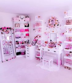 a room filled with lots of pink furniture and decor