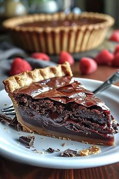 a piece of chocolate pie on a white plate