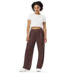 Upgrade your loungewear with our All-Over-Print Unisex Wide-Leg Pants, designed for ultimate comfort and style. These best-selling pants effortlessly blend fashion with function, making them perfect for everything from cozy pajamas to trendy streetwear. Whether you're lounging at home or stepping out, their super soft, stretchy fabric ensures comfort in every move. Crafted with premium knit mid-weight jersey fabric, these pants feature a relaxed unisex fit and an adjustable elastic waistband with a white drawstring for added comfort. Plus, the practical side pockets make them ideal for daily wear. Choose to wear them on the waist or hips for a customizable fit. The fabric's OEKO-TEX 100 standard certification guarantees safe, eco-friendly material that's gentle on the skin. Whether you're Comfy Lounge Pants, Pj Pant, Comfy Lounge, Cozy Pajamas, Trendy Streetwear, Coffee Lover Gift, Pj Pants, Pants With Pockets, Elastic Waist Pants