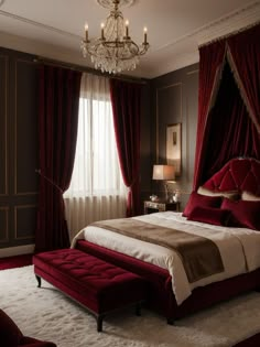 a bedroom with a bed, chandelier and red curtains