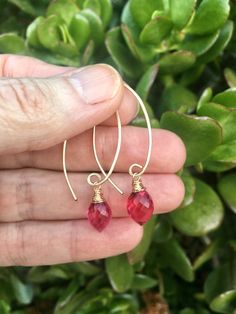 Gorgeous raspberry pink rubellite quartz has been lovingly wire wrapped in 14k gold filled wire. The dew drop shape is complemented by hand forged almond shaped 14 k gold filled ear hooks. Approximately 2" in length including the quartz dangle. If you'd like a different length or this design in sterling silver, please send me a message. A simple and minimalist statement of beautifully faceted color. Almond Shaped, Raspberry Pink, Gold Filled Earrings, Ear Hook, Pink Quartz, Hand Forged, Resin Art, Craft Gifts, Wire Wrapped