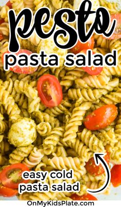 pasta salad with tomatoes and pesto on the side in a white bowl text reads pesto pasta easy cold pasta