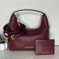 >>> New With Tags <<< Michael Kors Ember Small Messenger Crossbody Bag Color: Oxblood Penbled Leather Gold Hardware Adjustable / Detachable Shoulder Strap Interior Slip Pocket Zip Closure Measures Approx 9” X 8” X 4” Msrp: $448 Jest Set Travel Large Leather Card Case Gold Tone Hardware 3 Card Slots, 1 Id Window 4” X 3.25” X .25” Msrp: $128 Fast Shipping Michael Kors Brown Wallet With Removable Pouch, Michael Kors Brown Daily Wallet, Michael Kors Brown Satchel For On-the-go, Michael Kors Cognac Bag With Gold-tone Hardware, Michael Kors Brown Bags With Gold-tone Hardware, Card Case Wallet, Leather Card Case, Matching Cards, Michael Kors Bag