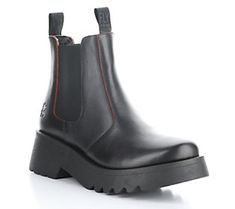 Dress up any occasion with the effortless style and comfort of this lightweight boot sporting an iconic utilitarian design that slips on and off with ease. From Fly London. Utilitarian Design, Lightweight Boots, Fly London, Effortless Style, Leather Boots, Fashion Shoes, Shoe Boots, Dress Up, Slip On