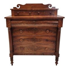 an old wooden dresser with drawers and knobs on the bottom drawer, against a white background