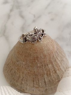 This fun ring has an octopus with swirling tentacles. Available in whole sizes 6-9. Sterling silver. 3/8" across widest point. Ringed Octopus, Squid Rings, Blue Ring Octopus, Sterling Silver Turtle-shaped Rings, Octopus Ring, Octopus Jewelry, Crystal Accessories, Rings Cool, Toe Rings