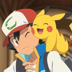 pikachu and ash hugging each other