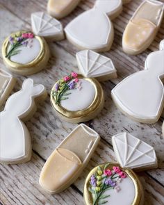 some decorated cookies are sitting on a table