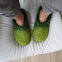 Felt slippers made in two shades of green sheep wool on the outside with yellow on the inside.These womens house shoes in ombre green will bring the freshness of spring inside your home.  At Wooppers we make boiled wool slippers / wool clogs in environment conscious manner. Ours are health slippers that will massage your feet gently in a most comfortable way. Find more about the benefits of wearing Wooppers here---->https://www.etsy.com/shop/Wooppers?ref=hdr_shop_menu#aboutSIZESPLEASE INDICAT Comfortable Green Indoor Slippers, Green Comfortable Slippers With Round Toe, Green Slip-on Slippers With Soft Sole, Comfortable Green Closed Toe Slippers, Green Casual Indoor Slippers, Casual Green Slippers With Soft Sole, Wool Clogs, Ombre Green, Felt Slippers