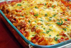 a casserole dish with meat and cheese in it