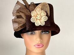 "The featured hat is a brown velvet with a floral pattern winter hat. The  hat has been adorned in sinamay flowers, loops and swirls. The colors combined on this hat is beige, ivory, chocolate light brown and dark brown. This hat is classy, well made and sophisticated. This hat can be worn as a winter Church Hat, a Wedding Party Hat, a Tea Party hat, a Downton Abbey  hat, and any other special occasion. A wool winter hat for warmth and style together. Brim: Rolled Brim 1\" Rise: 5\" Size: 22\"" Winter Bucket Hat, Church Hat, 1920s Style, Tea Party Hats, Wool Winter, Church Hats, Brown Velvet, 1920s Fashion, Party Hat