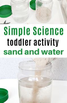 a jar filled with sand and water sitting on top of a table next to other jars