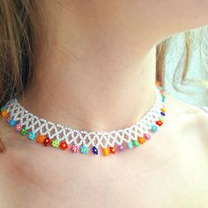 This handmade colorful flower daisy necklace is carefully hand-woven from the highest quality small glass seed beads! Dainty choker collar necklace is the ideal handmade gift women's jewelry for you and your loved ones! It is an elegant daisy necklace that is compatible with all your clothes that you can use in all seasons! Guaranteed to get all the compliments! You can click the link for other handmade jewelry and accessories! https://yasminjewelrygifts.etsy.com Once you order, it will be shipp Handmade Flower Shaped Choker For Summer, Handmade Flower Choker For Summer, White Flower Necklace With Colorful Beads For Summer, White Summer Flower Necklace With Colorful Beads, Summer White Flower Necklace With Colorful Beads, White Beaded Flower Necklace For Summer, White Bohemian Flower Necklace With Round Beads, Summer White Beaded Flower Necklace, White Flower Necklace With Tiny Round Beads