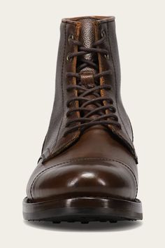 Crafted from premium Scotchgrain pebbled leather and detailed with smooth calfskin or in all over waxed walnut suede, this modern lace up boot features Goodyear welted construction stitched to a durable rubber outsole. A cap toe overlay makes for a dressier more sartorial look. This boot has a dressier look, but will w Men’s Dress Boots, Cap Toe Boots, Mens Dress Boots, Rugged Boots, Gentleman Shoes, Side Zip Boots, Mens Boots Fashion, Boot Style, Mens Leather Boots