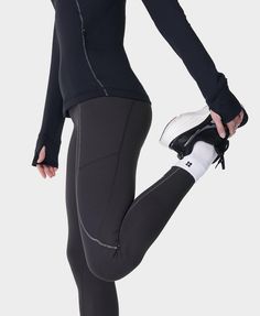 An updated version of our bestselling winter run leggings. Updated 78% recycled fabric is stretchy and sweat-wicking

. Part of our innovative HeatProtect collection with a ‘Base’ rating for temperature-regulating and sweat-wicking protection in all elements. Brushed, fleece-feel lining and high elasticated waist that stays put as you move. Two side pockets, one back zip pocket and reflective seam detailing. Inseam length: 27" / 68cm. Model wears size S and is 178cm/5'10" tall. Style Code: SB990 Running Leggings, Sweaty Betty, Grey Women, Recycled Fabric, Women's Leggings, Dark Grey, Zip Pockets, Leggings, Running