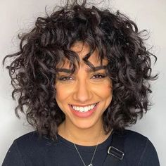 33 Pretty Spring Haircuts To Freshen Up Your Look Thick Curly Hair Medium Length, Cute Curly Haircuts Natural Hair, Square Jaw Curly Hair, Curly Shag Bob Haircut, Curly Hair Color Ideas Pale Skin, Curly Shag Haircut Round Face, Wavy Shag Haircut Short Round Face, Short Curly Haircuts For Long Faces, 40 Year Old Curly Hair Styles