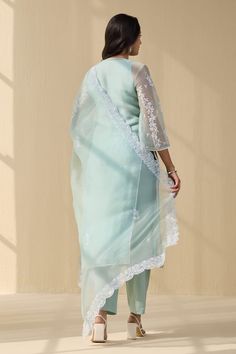 Powder green three fourth sleeves A-line kurta crafted in organza with lily bloom contrasting white thread embroidery. Paired with a cotton satin pant and scallop border embroidered dupatta. - Aza Fashions White Thread Embroidery, Satin Pant, Organza Embroidery, Scallop Border, Green Thread, Kurta Pant Set, Lily Bloom, A Line Kurta, Green Powder