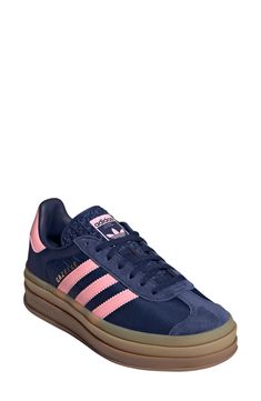 A triple-stacked platform elevates a time-tested sneaker, while serrated side stripes keep it close to its roots. Lace-up style Removable insole Leather upper/synthetic and textile lining/synthetic sole Imported Trendy Shoes For Women Sneakers, Platform Gazelle, Cute Platform Shoes, Blue Gazelle, Adidas Bold, Pink Gazelles, Pink Adidas Shoes, Navy Adidas