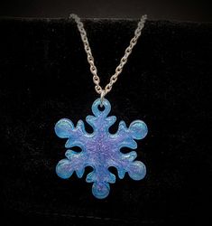 Embrace the beauty of winter with our Enchanted Snowflake Necklace! Inspired by the magical allure of snow and ice, this exquisite piece features a stunning snowflake pendant that sparkles like freshly fallen snow. Crafted from high-quality materials, the intricate design captures the delicate elegance of nature, making it a perfect accessory for any occasion. The necklace hangs gracefully on an adjustable chain, allowing you to customize the length for a flawless fit. Whether you're dressing up for a special event or adding a touch of whimsy to your everyday style, the Enchanted Snowflake Necklace is sure to become a cherished favorite. Key Features: Stunning snowflake pendant that sparkles beautifully Adjustable chain for a perfect fit Made from durable, hypoallergenic materials Ideal fo Winter Snowflake Necklace, Beauty Of Winter, Snowflake Necklace, Snowflake Pendant, Snow And Ice, Pendant Necklaces, Enchanted, Everyday Fashion, Jewelry Necklace Pendant