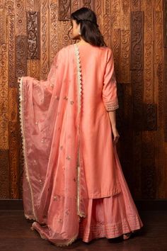 Pink silk chanderi kurta featuring floral embroidery and a notched neckline. Paired with an embroidered palazzo and a scalloped lace hem organza dupatta., Fit: Relaxed Kurta Palazzo Set, Chanderi Dupatta, Embroidered Patterns, Pink Kurta, Notched Neckline, Palazzo Set, Embroidered Organza, Organza Dupatta, Women Kurta