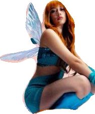 a woman with red hair sitting on top of a blue stool wearing a fairy costume