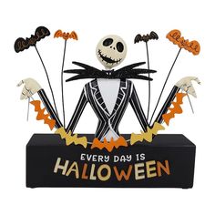 a halloween decoration with jack skellings and bats