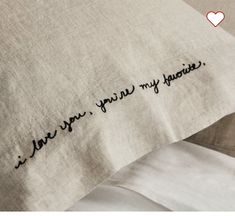 a pillow with the words i love you, my favorite written on it in cursive writing