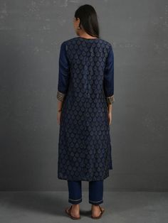 Indigo Block Printed Handwoven Chanderi Kurta with Mul Slip and Pants (Set of 3) By The Neem Tree now available at Trendroots Indigo Printed Straight Kurta Set, Bandhani Print Chanderi Palazzo Set With Straight Kurta, Chanderi Bandhani Print Palazzo Set With Straight Kurta, Chanderi Block Print Churidar With Long Sleeves, Long Sleeve Chanderi Churidar With Block Print, Indigo Straight Kurta Set For Eid, Festive Straight Kurta Churidar With Block Print, Indigo Block Print Sets For Diwali, Festive Indigo Sets With Block Print