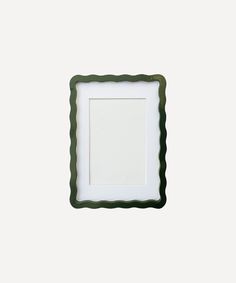 a white and green frame with an empty square in the middle