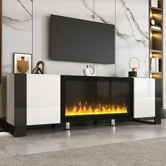 an entertainment center with a fireplace in the middle