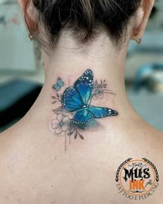 a woman with a blue butterfly tattoo on her neck