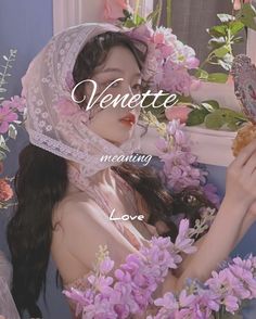 a woman holding a butterfly in her hand and surrounded by flowers with the caption venettee meaning love