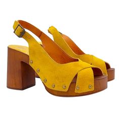 "Unique and special handmade women's shoes, made with scrupulous attention to detail and materials. Women's sandals with brown wood effect base Crossed bands in yellow suede Adjustable ankle strap 8.5cm block heel with 2.5cm plateau Comfortable and light Entirely made by specialized Italian personnel Handcrafted using the best materials Designed & Produced By \"MY Clogs\" BEFORE PURCHASING DO NOT FORGET TO CHECK THE SIZE!" Yellow Open Toe Sandals With Wooden Heel, Yellow Open Heel Slingback Sandals, Suede Sandals With Wooden Heel And Ankle Strap, Yellow High Heel Sandals With Wooden Heel, Yellow Sandals With Wooden High Heel, Yellow Leather Sandals With Wooden Heel, Yellow Open Toe Heels With Wooden Heel, Yellow Heels With Wooden High Heel, Yellow High Heels With Wooden Heel