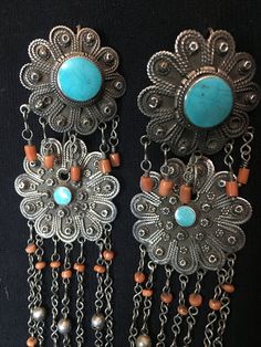 "Earrings ~ Afghanistan, Antique pair of earrings, Silver, Coral and Turquoise. 1930s early to mid 20th century. Length: 6\" Width: 1 3/4\" Tribal Silver Such an Amazing Find. Yes ~ along with basic simplicity ~ It's all about you You deserve to know about my fabulous Treasure chest HeartbeatHandmade and Big Sur Jade Treasures both (Etsy sites) Tribal Jewelry, Statement Piece Jewelry, Art to Wear Jewelry, Fantastic Fine Leather Beaded Handbags, an array of treasures for the traveler and mystic w Bohemian Collectible Earrings, Collectible Bohemian Earrings, Antique Dangle Earrings For Vintage Collection, Antique Dangle Earrings From Vintage Collection, Vintage Hallmarked Dangle Earrings, Traditional Turquoise Jewelry With Filigree, Traditional Turquoise Filigree Jewelry, Vintage Chandelier Earrings With Intricate Design, Vintage Dangle Earrings For Vintage Collection