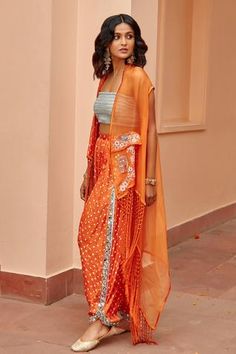 Orange dhoti pant in gajji silk base with bandhani work and mirror embroidered hem. - Aza Fashions Cape For Women, Beaded Cape, Embroidery Beads, Drape Pants, Pant For Women, Dhoti Pants, Open Neck, Tie And Dye, Silk Embroidery