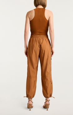 Experience the effortless comfort and chic style of the Nitsan Parachute Pant. Perfect for warmer weather, this everyday classic is the perfect special addition to your wardrobe. These elevated basics will have you ready for any casual occasion. Step out in style. Details Pull on styleCinched Straight legCargo pocket detailsCropped length Content and Care 100% PolyesterDry CleanImported Measurements 26in inseamMeasurements from size S Ankle-length Pants With Elastic Side Panels, Versatile Relaxed Fit Parachute Pants For Fall, Versatile Spring Parachute Pants With Tapered Leg, Versatile Fall Parachute Pants With Relaxed Fit, Versatile Parachute Pants With Relaxed Fit For Fall, Versatile Tapered Leg Parachute Pants For Spring, Relaxed Fit Pants With Elastic Side Panels For Fall, Relaxed Fit Fall Pants With Elastic Side Panels, Fall Pants With Elastic Side Panels And Relaxed Fit