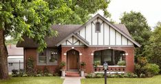 a red brick house with the words before and after