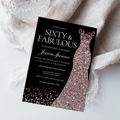 a black and pink wedding card with glitter on it